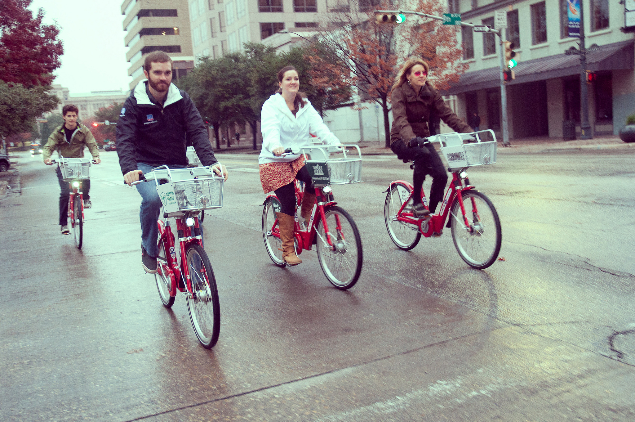 four casual cyclists use Austin's B-cycles downtown