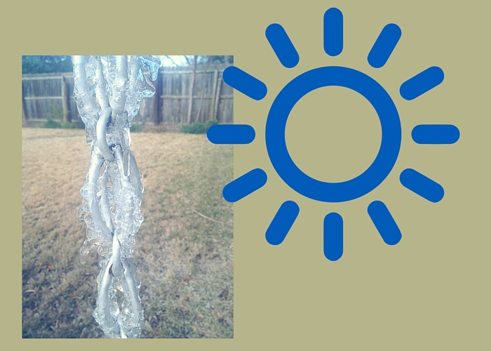 Image of icicle with sun.