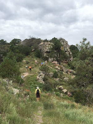 Hikers on Mt. Livermore trail in Davis Mountains Preserve.