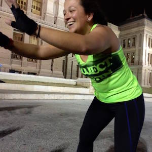 Gina Rivera working out with Project Austin in front of the Texas State Capitol.